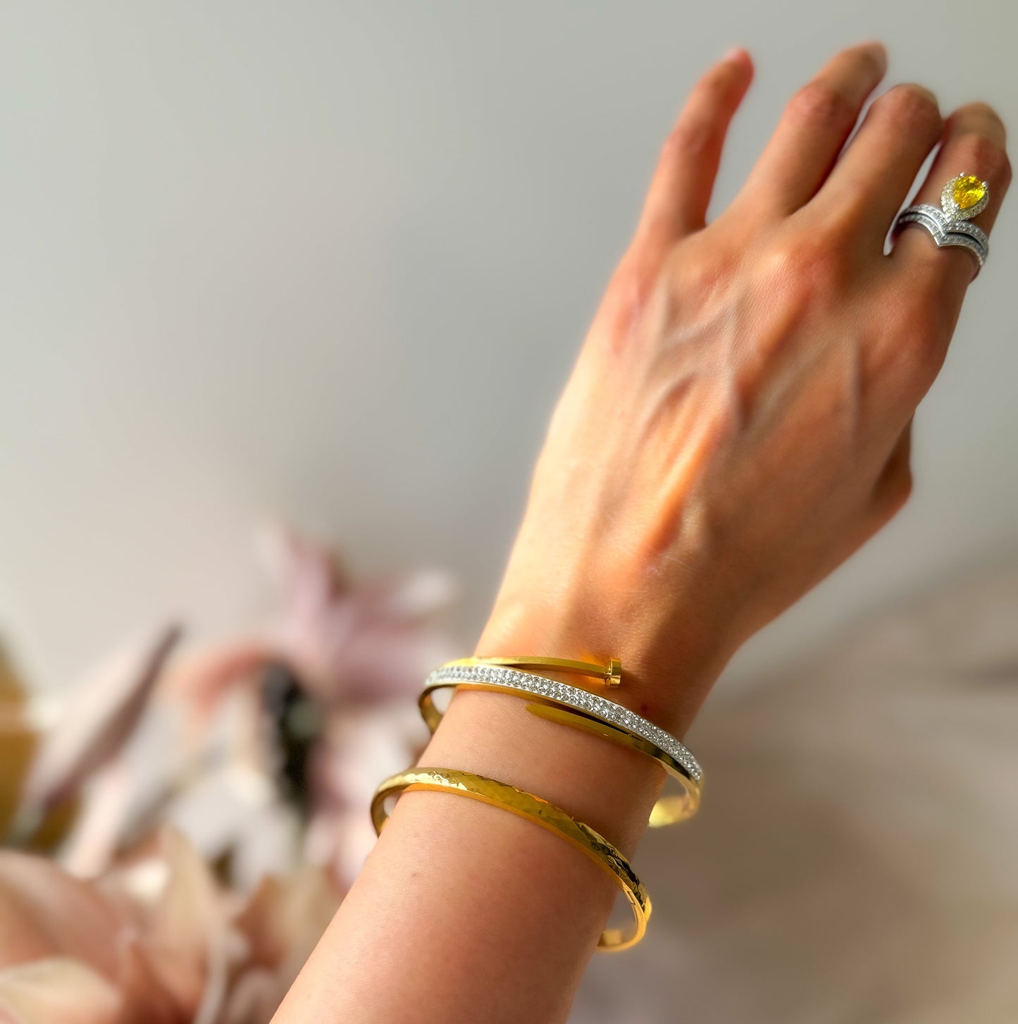 Laila- Gold Plated twisted Bracelet with Zircon Stones