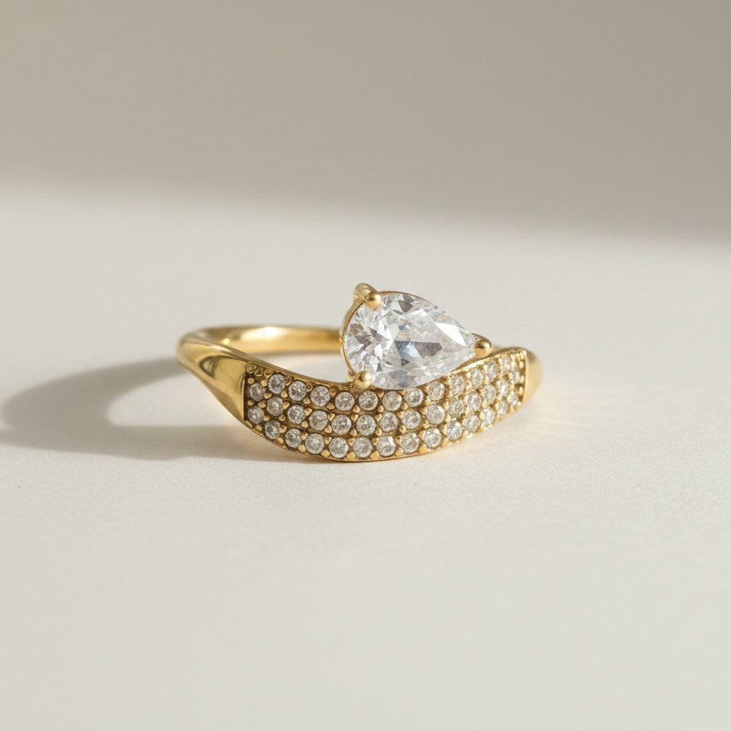 Sheba- 18K Gold Plated Zircon Tear Drop on a Pave Ring