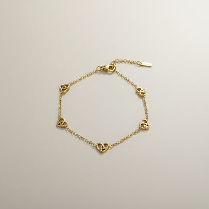 Elle- 18K Gold Plated Dainty Heart Knot Bracelet